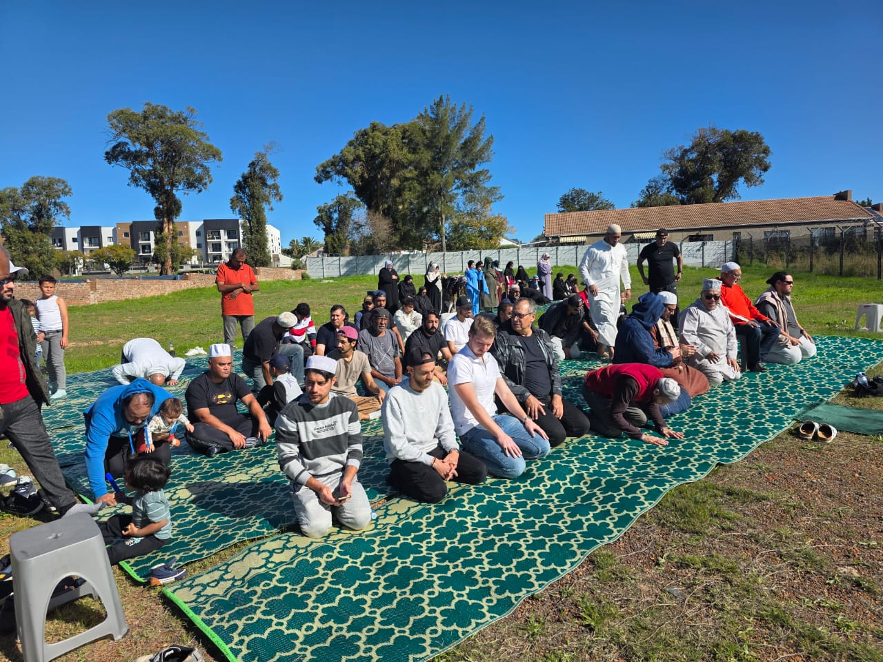 Community members sharing breakfast after Fajr